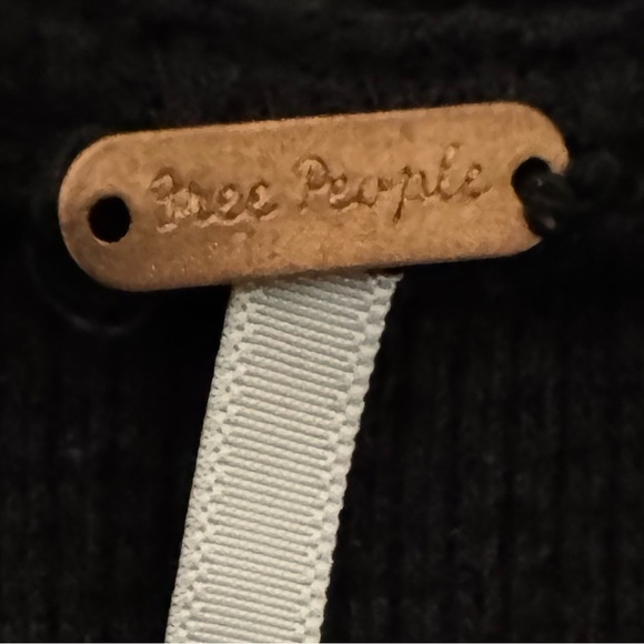 Free People - Woman’s Black top with detail on sleeves
(Listing #43) - Picture 9 of 9